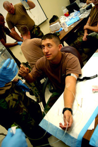 401px-US_Navy_081203-N-3674H-278_Ensign_Christopher_Waldrop_receives_saline_solution_via_intravenous_therapy-1